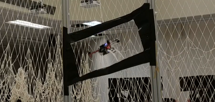 Flying Through a Narrow Gap Using End-to-End Deep Reinforcement Learning Augmented With Curriculum Learning and Sim2Real